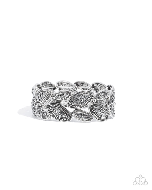 Riding the Clutch - Silver - Paparazzi Bracelet