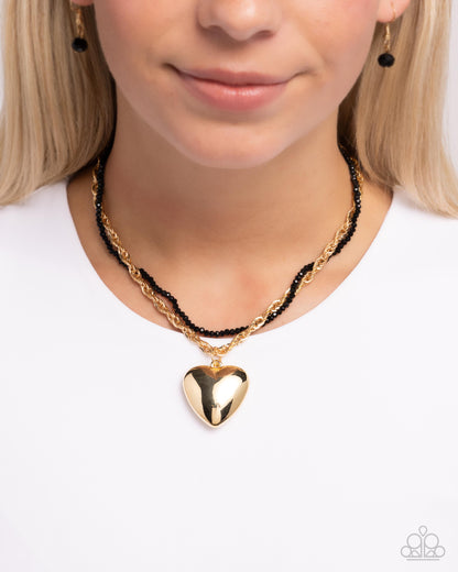 Falling Slowly - Gold - Paparazzi Necklace