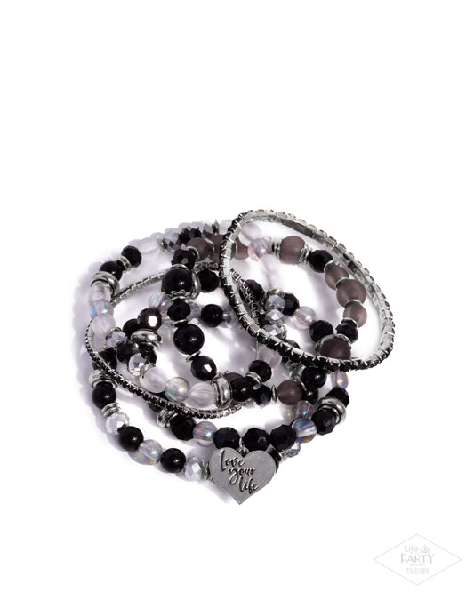 Optimistic Opulence - Black - Paparazzi Bracelet (2025 Pink Diamond)