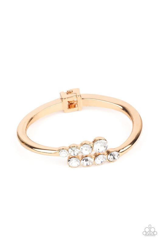 Defying Dazzle - Gold - Paparazzi Bracelet