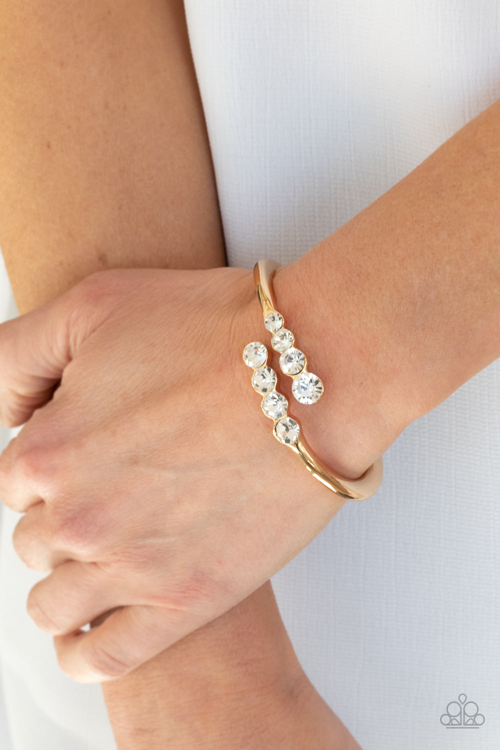 Defying Dazzle - Gold - Paparazzi Bracelet